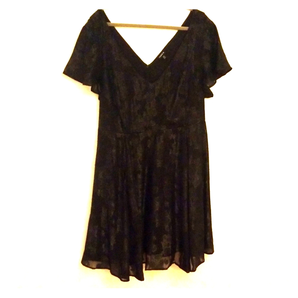 Black patterned cocktail dress.